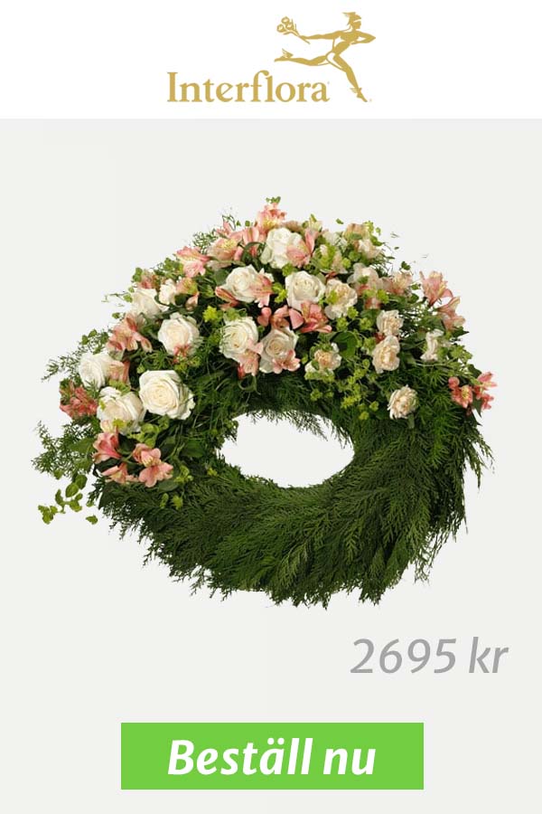 Begravningskrans med rosa och vita blommor