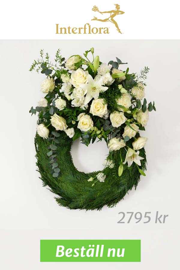 StÄende begravningskrans med vita blommor