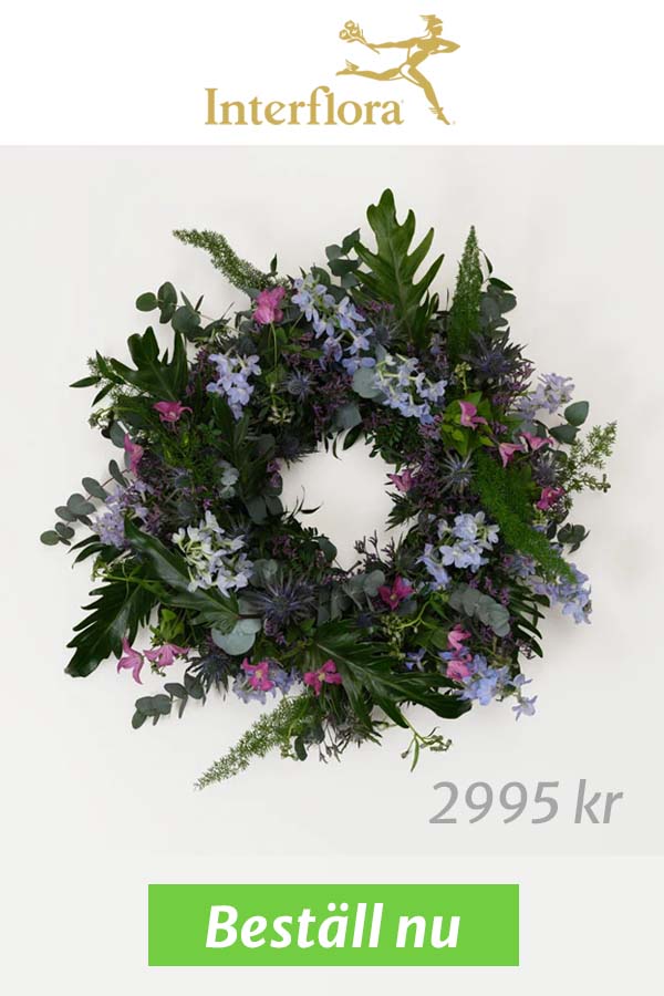 Blomkrans med blÄa blommor